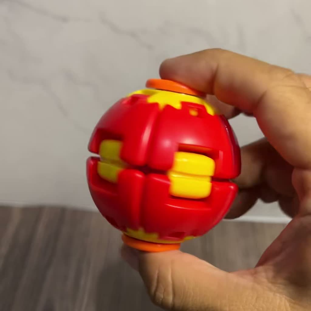 Pelota Spinner armada en la mano